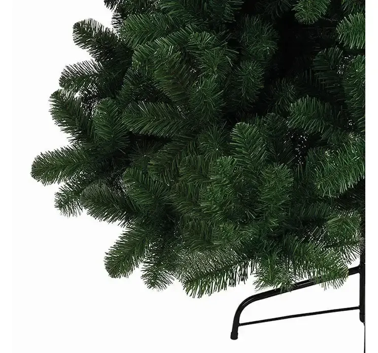 Kunstig gran juletræ imperial af plast i grøn closeup