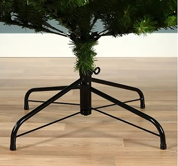 Kunstig gran juletræ killington slim af plat i grøn med LED lys closeup af fod